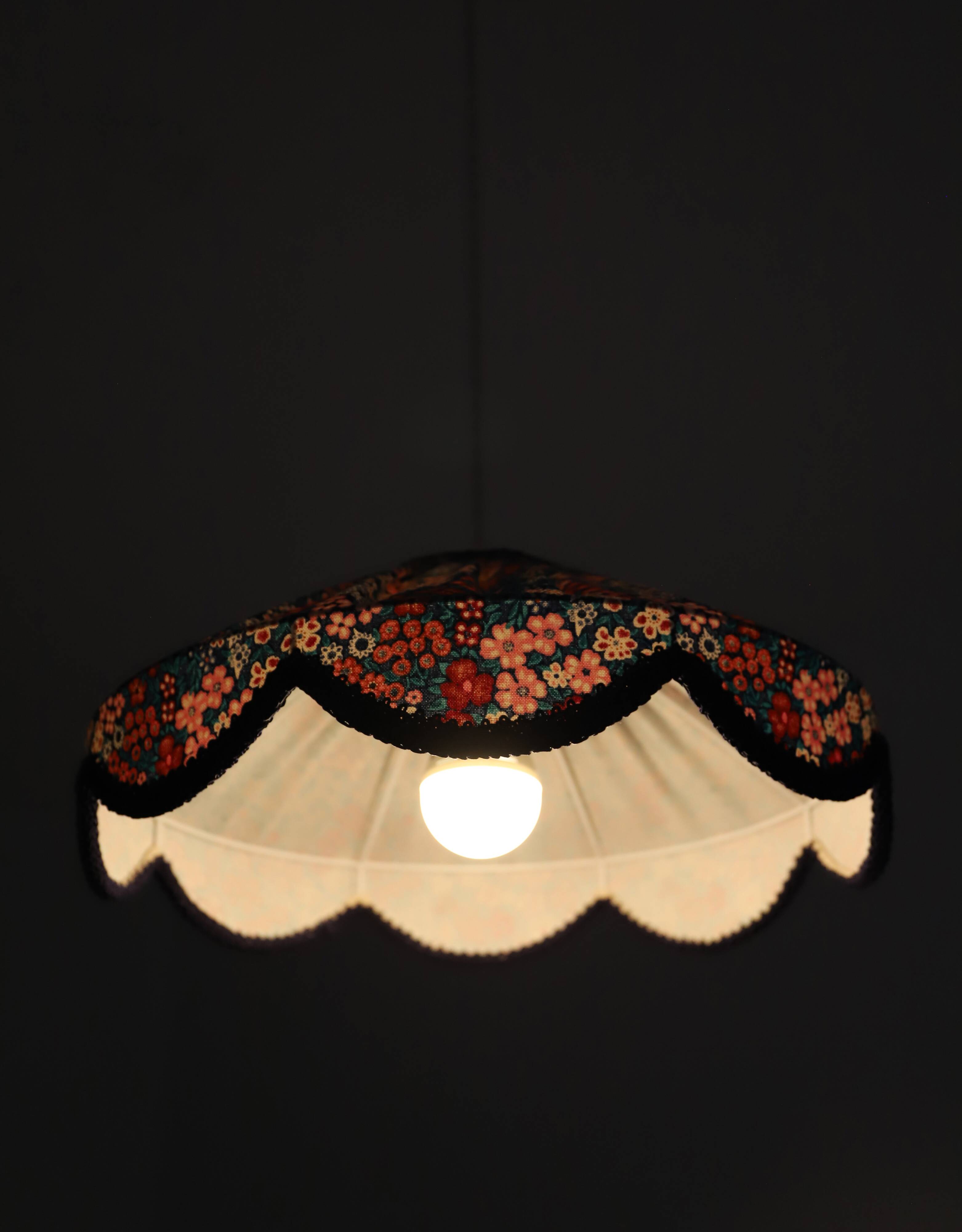 Cosette floral pendant light with "thousand flowers" print