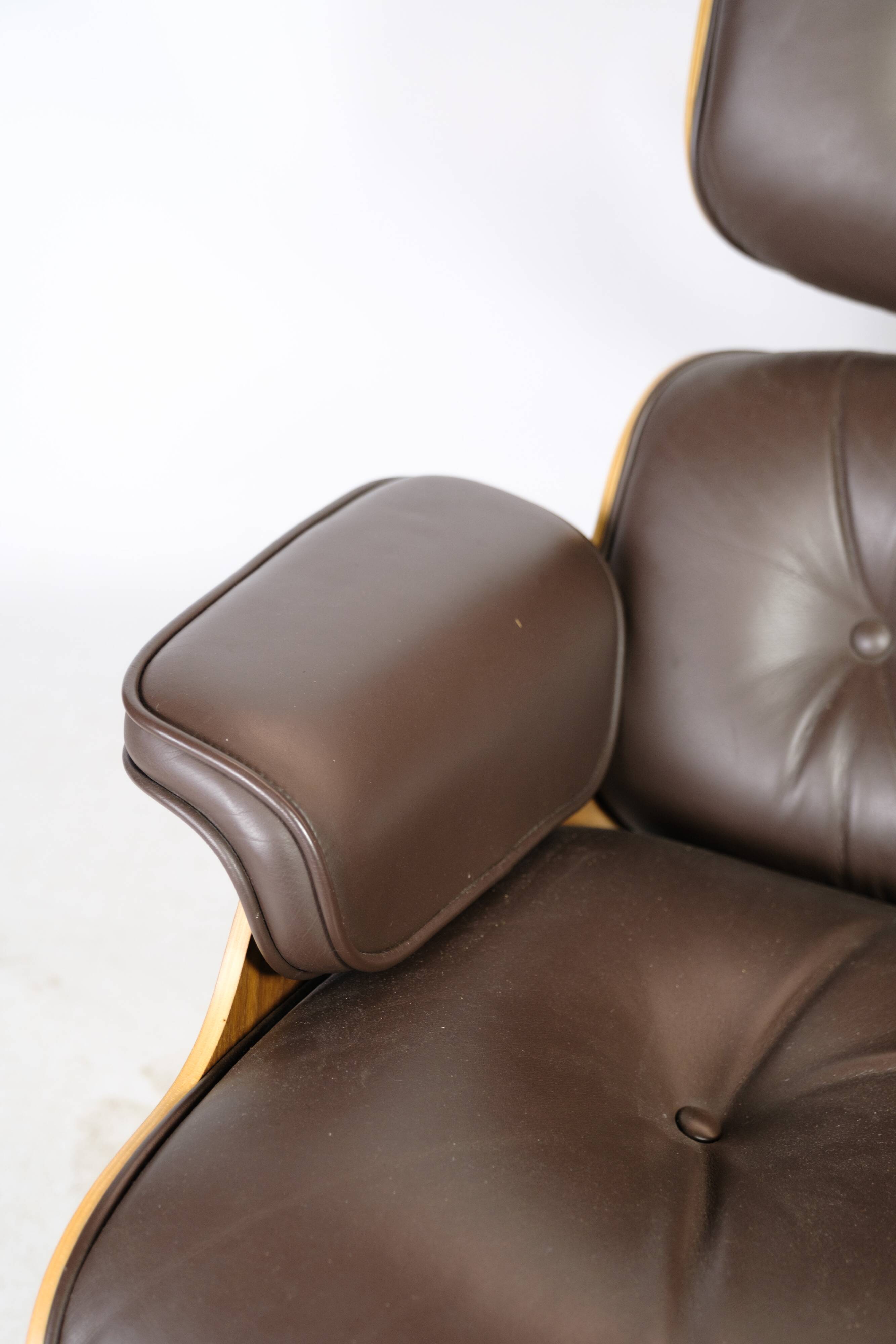 Charles Eames Lounge Chair In Brown Leather And Light Walnut