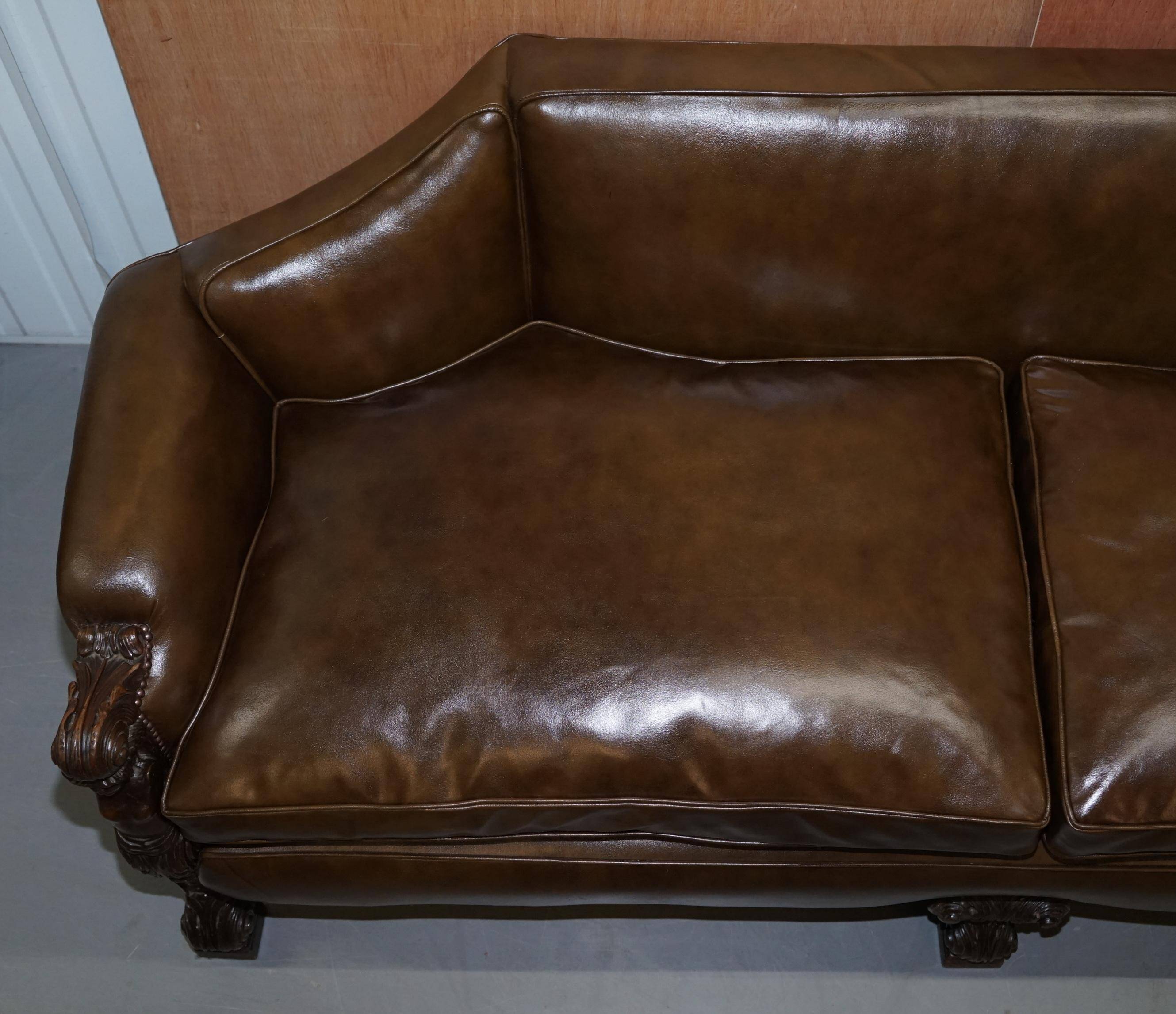 Restored Regency canapé in leather with sculpted Hermès frame.
