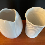 A pair of vintage ceramic vases from the 1970s.