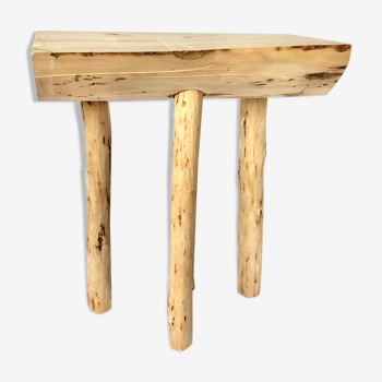 Wooden tripod farm stool