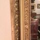 Miroir époque Restauration en bois doré à la feuille