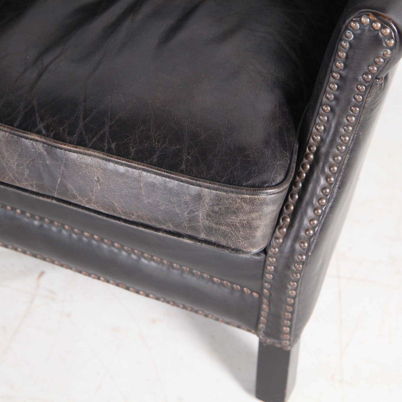 Pair of small leather club armchairs