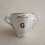 Lean fat sausage in Limoges porcelain