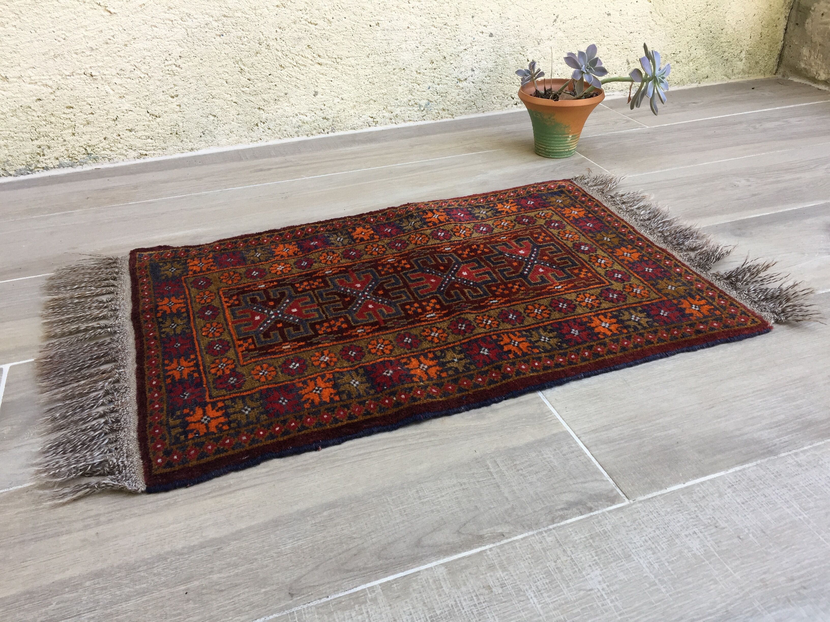 Small oriental wool rug - 80 x 46cm