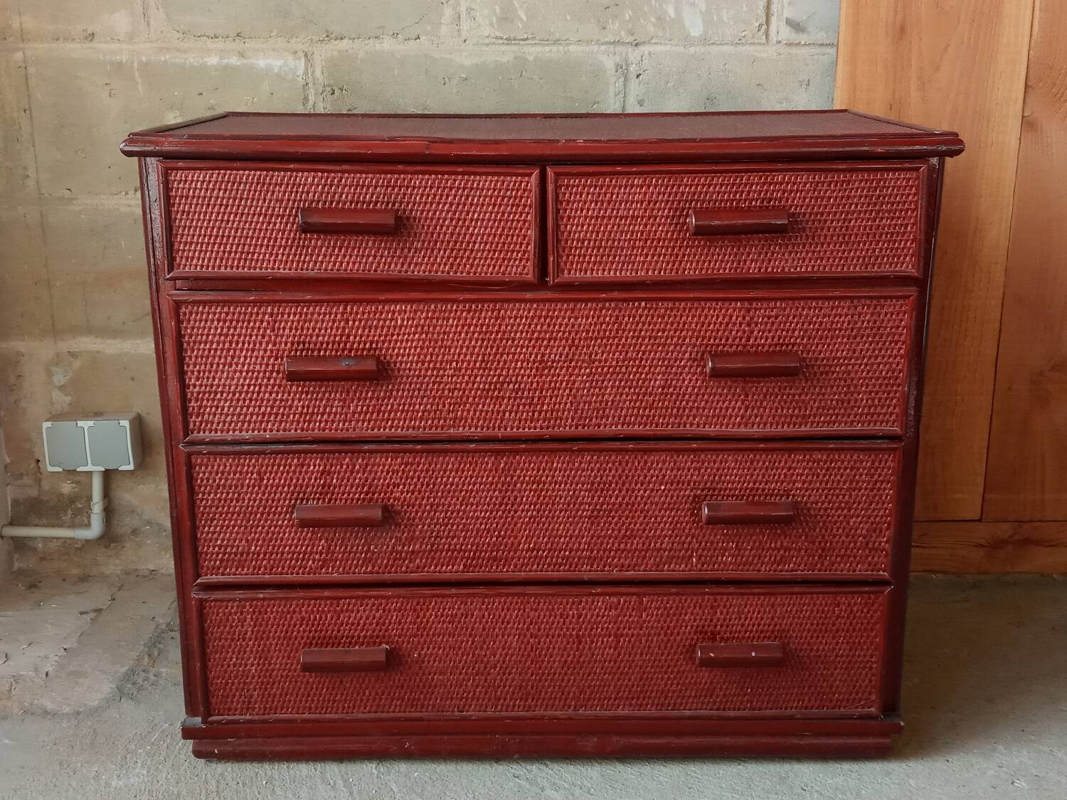 Vintage red lacquered rattan chest of drawers