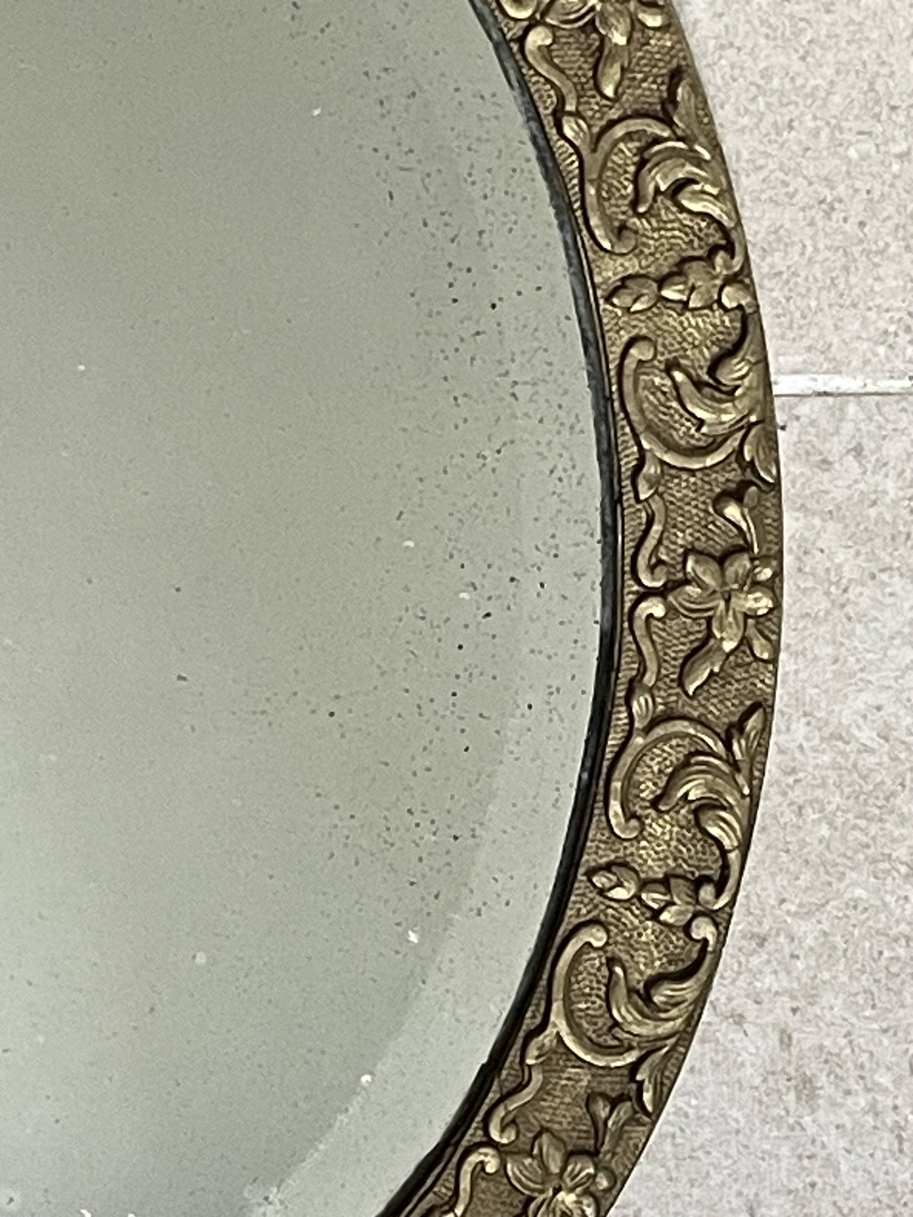 19th century beveled oval mirror