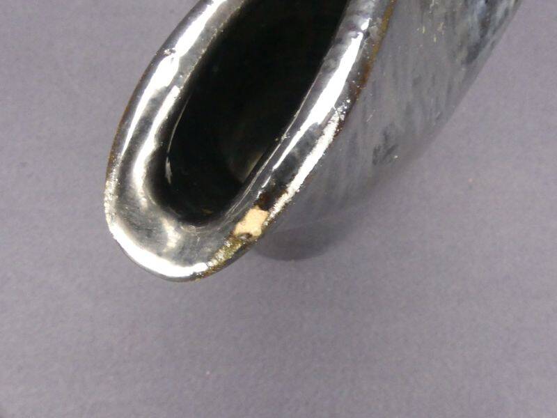 Old Biot, modernist pitcher in iridescent black ceramic.