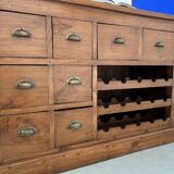 Two-sided paneled counter, bottle storage