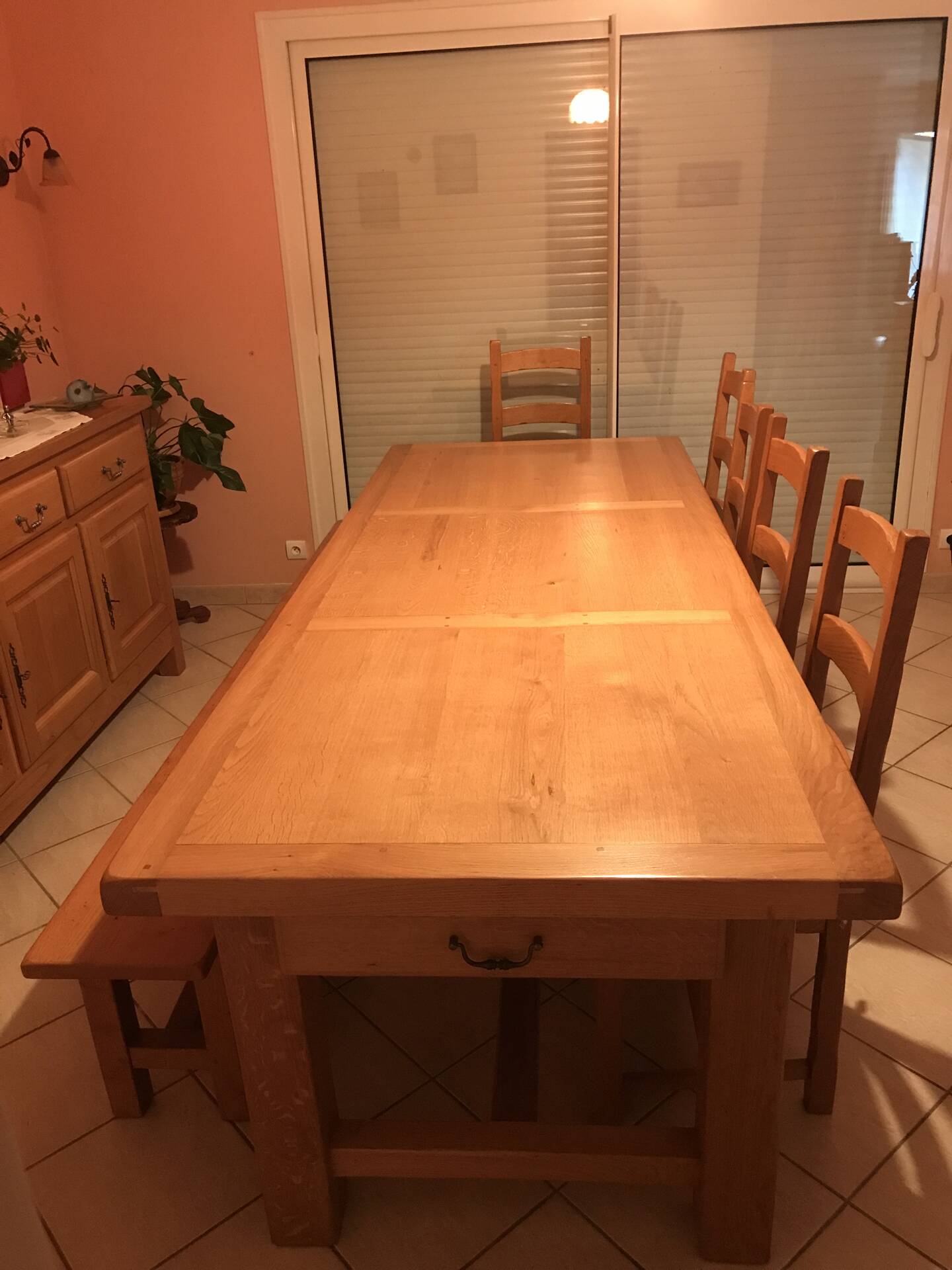 Solid oak dining table made by a craftsman cabinetmaker.