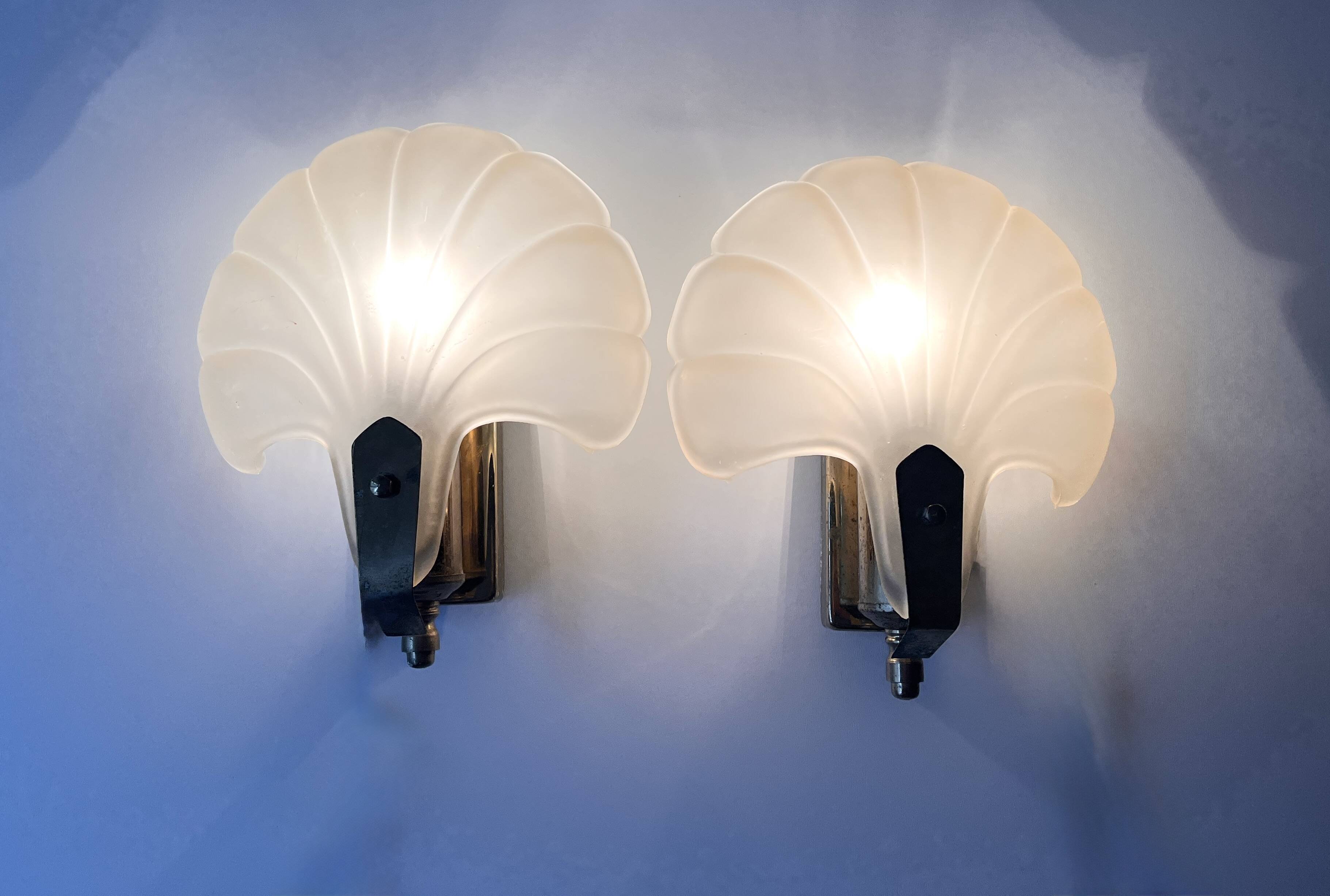 Pair of vintage shell glass wall lights, Art Deco style fixtures.