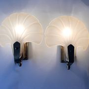 Pair of vintage shell glass wall lights, Art Deco style fixtures.