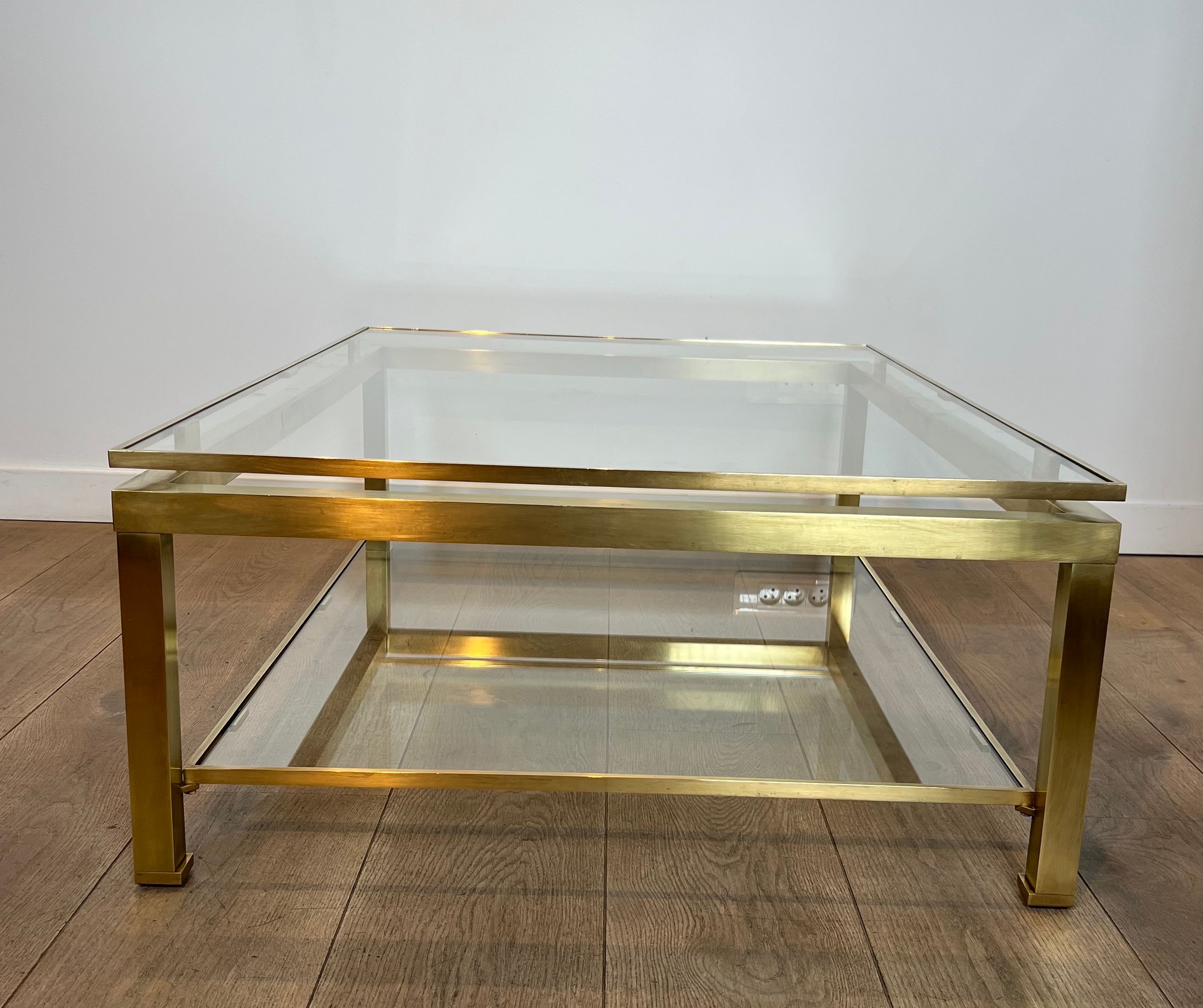 Modernist coffee table in brass and glass tops by Guy Lefèvre for Maison Jansen.