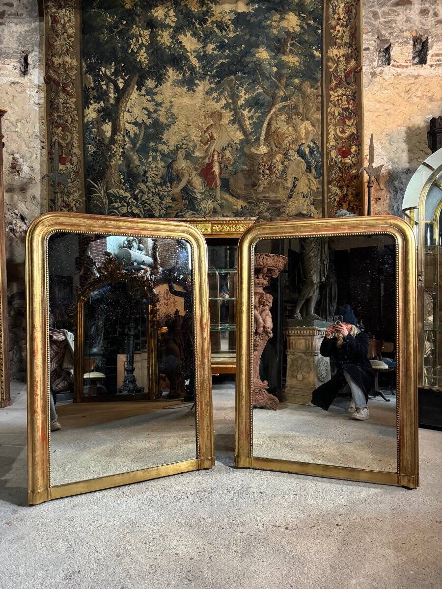 Pair of Louis Philippe period mirrors in gilded wood 1.30m x 89cm