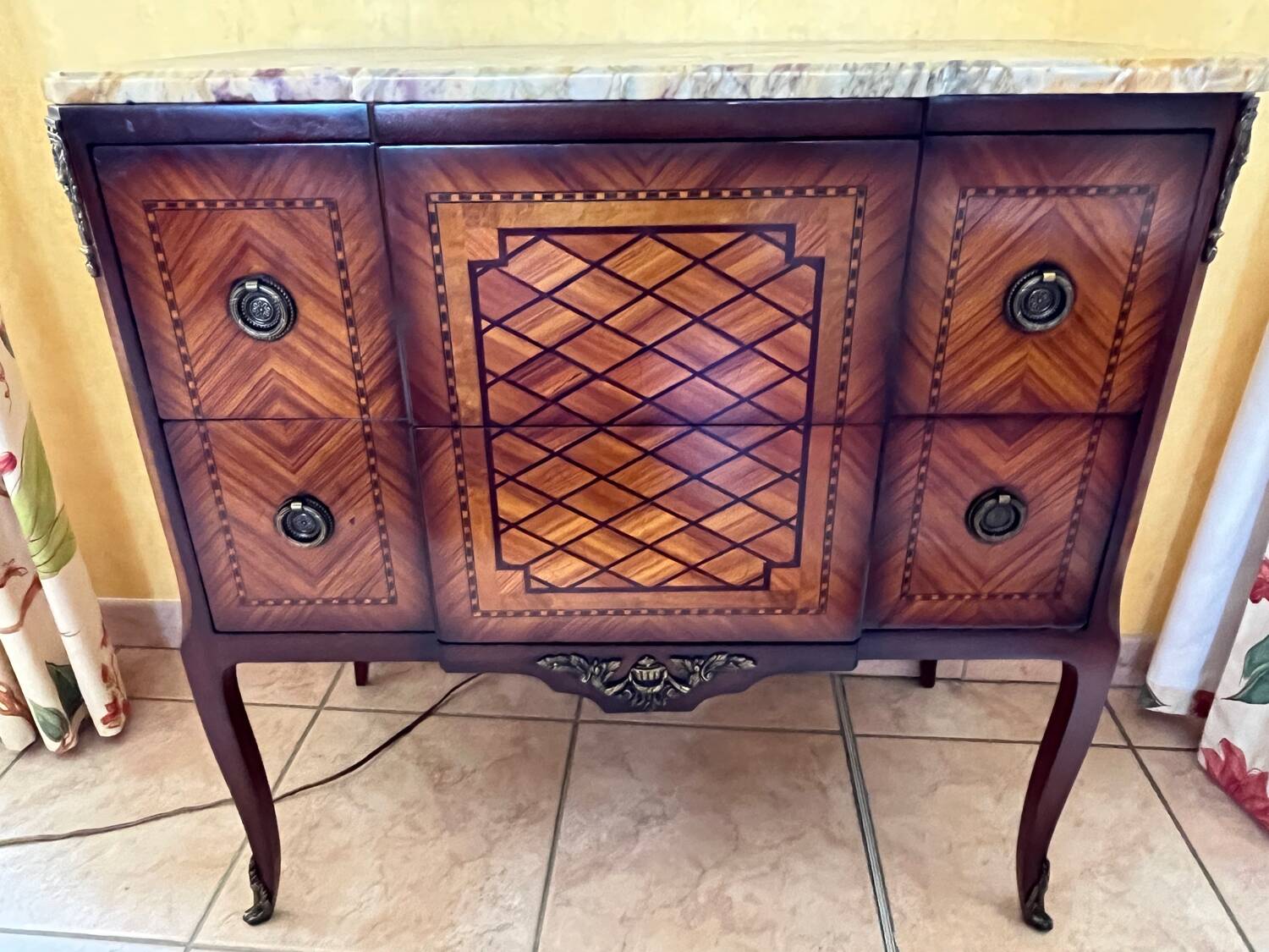 Small piece of furniture with marble top