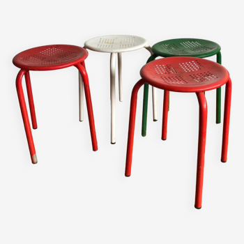 Series of four industrial metal stools