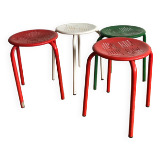 Series of four industrial metal stools