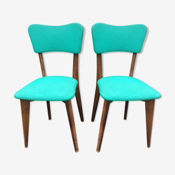 Paire de chaises vintage à pieds compas skaï vert et piétement en hêtre