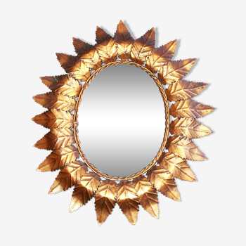 Oval sun mirror, 61x52cm.