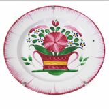 Plate and its wall attachment