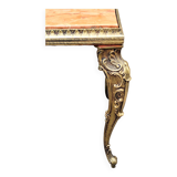Coffee table with curved legs and pink marble top