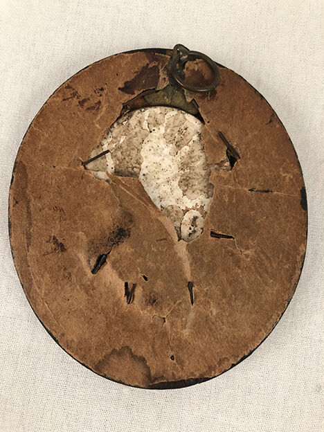 Miniature on medallion porcelain, blackened wooden frame