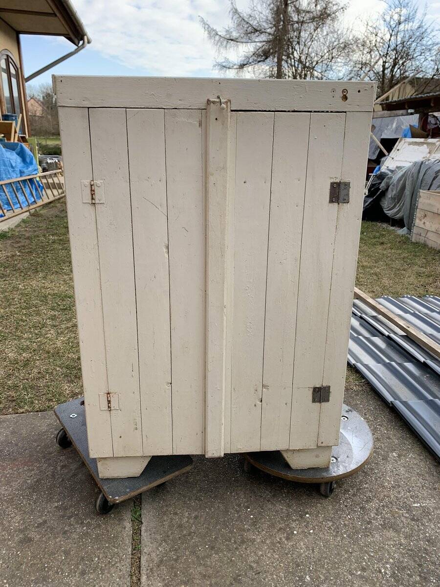 Antique beige-painted solid wood furniture, rustic late 19th-century cabinet with a single door.