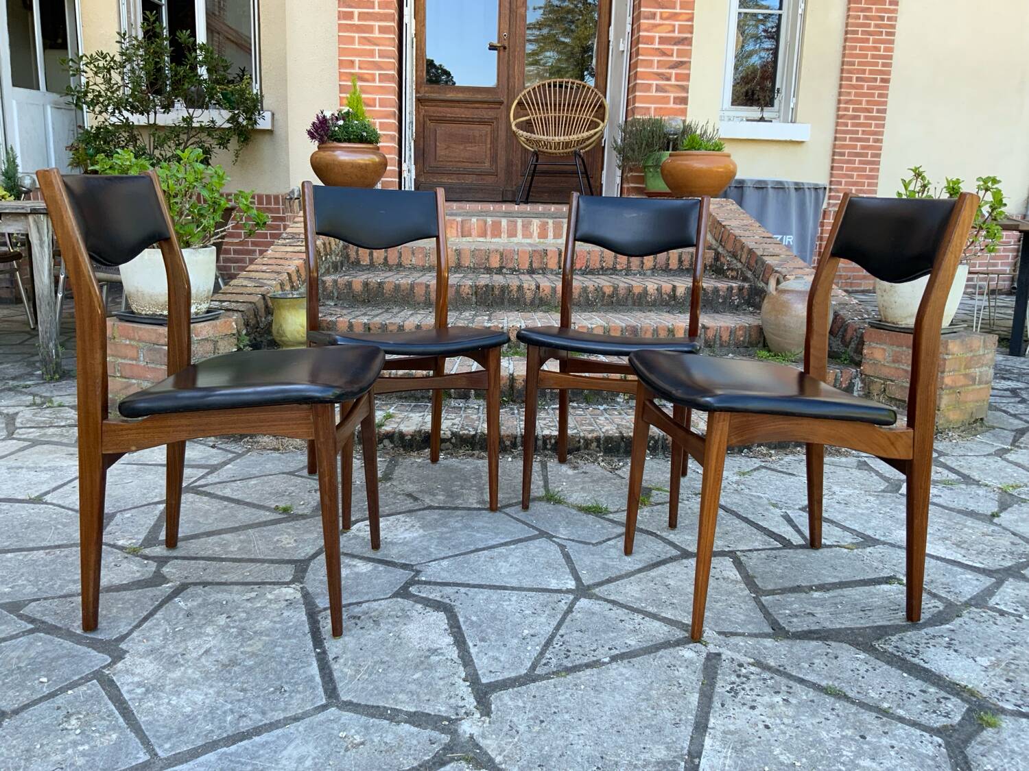 4 Scandinavian black leatherette chairs