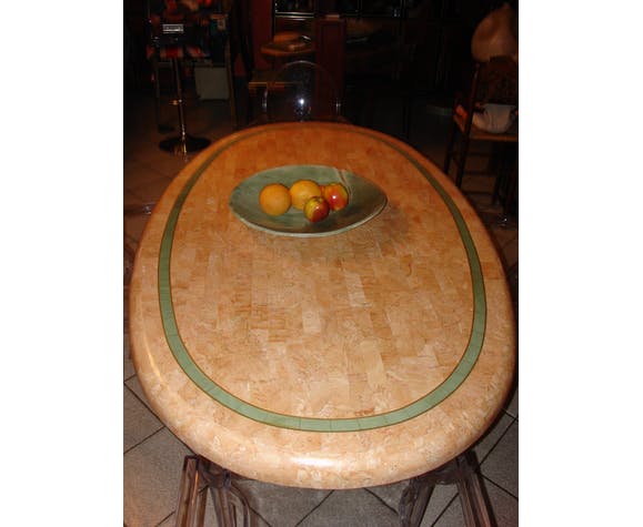 Ovoid table in pink and green travertine, circa 1975