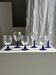 Set of 3 large blue stemmed glasses and 3 small blue stemmed glasses