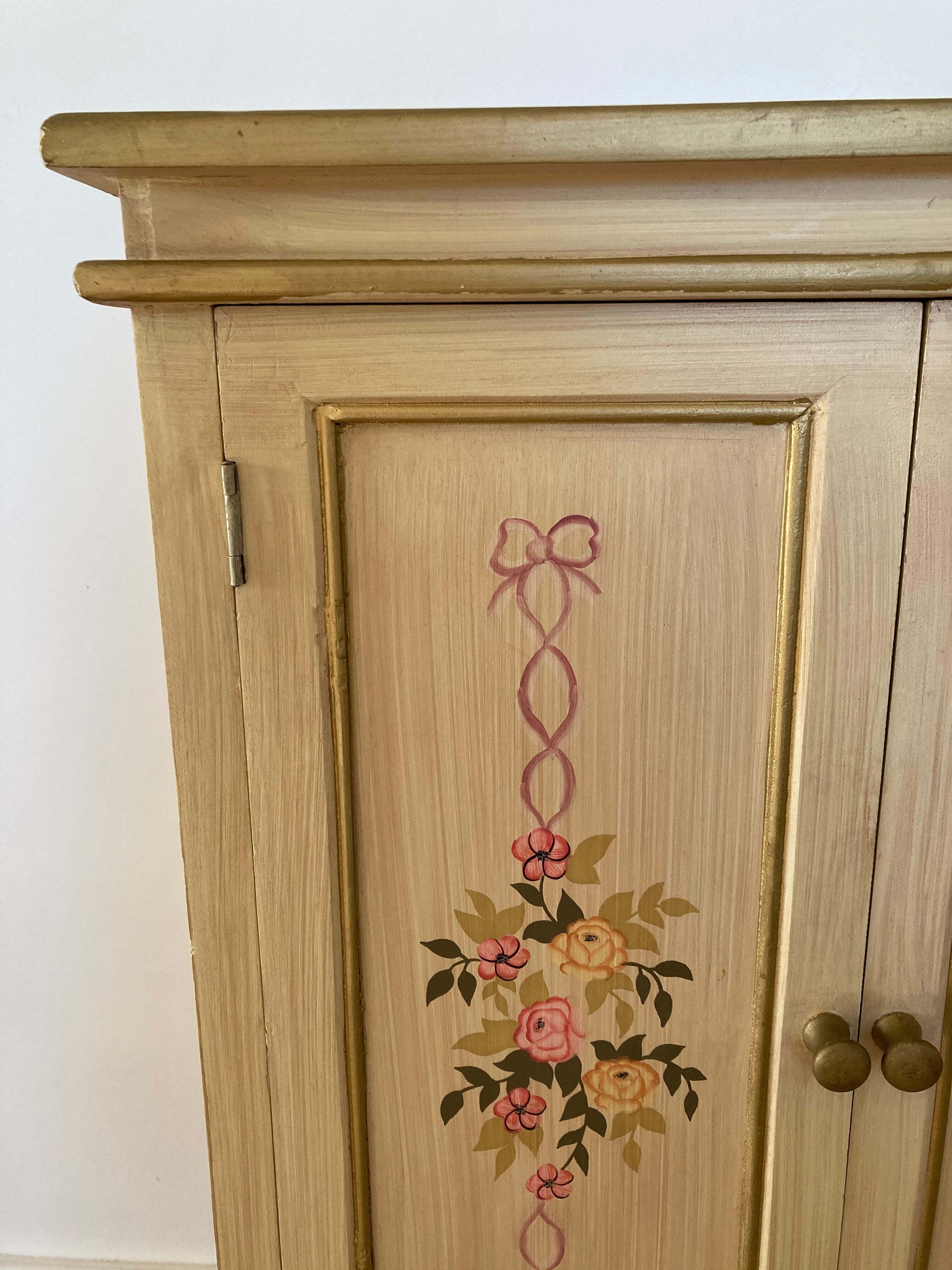 2-door flowered wooden cabinet
