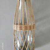Glass and rattan bottle