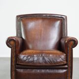 Vintage sheepskin armchair with beautiful warm colors and excellent seating comfort