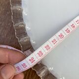 Opaline wafer with wavy edge