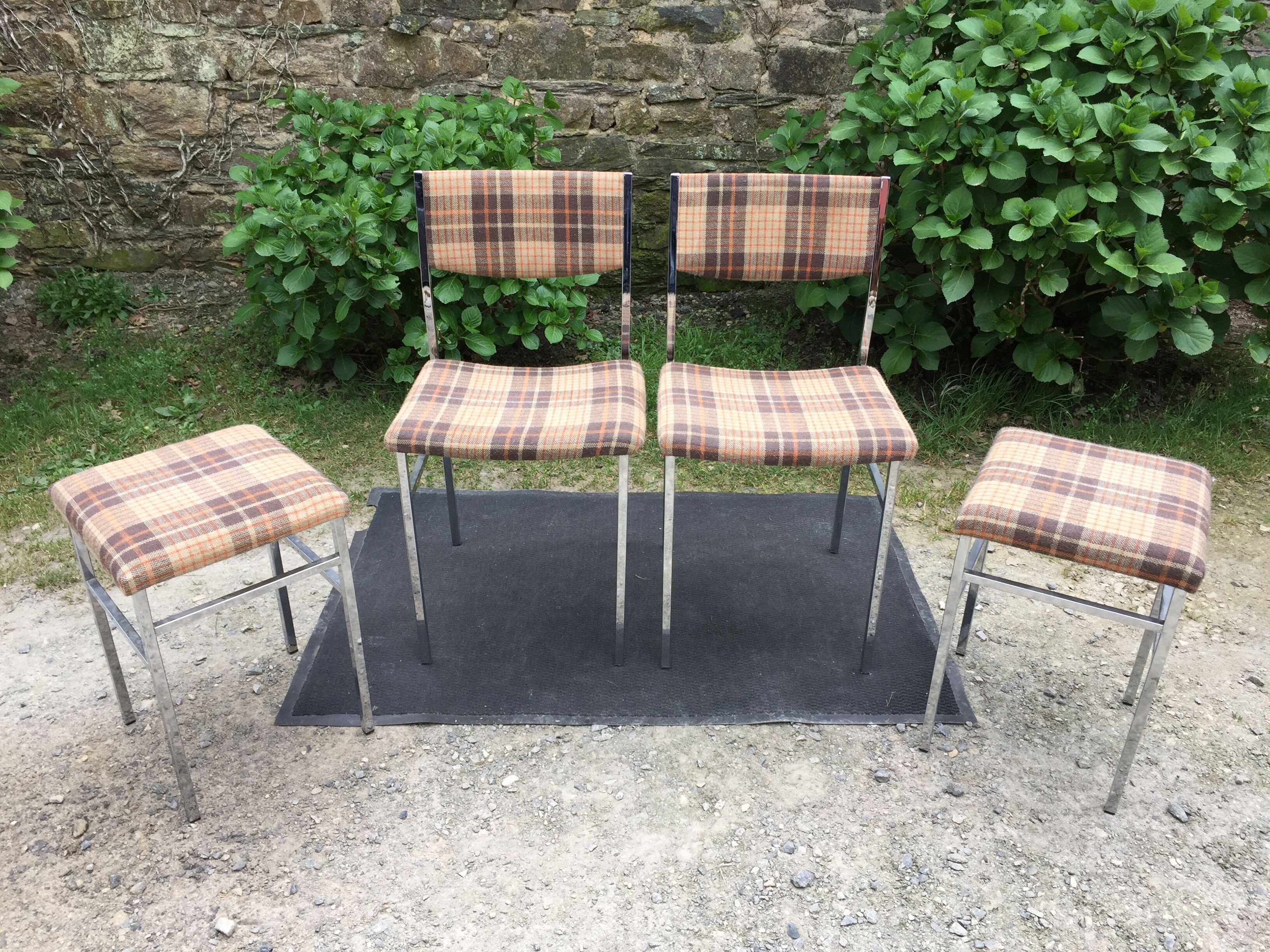 Vintage chairs and stools with chrome-plated square tubular metal base.