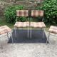 Vintage chairs and stools with chrome-plated square tubular metal base.
