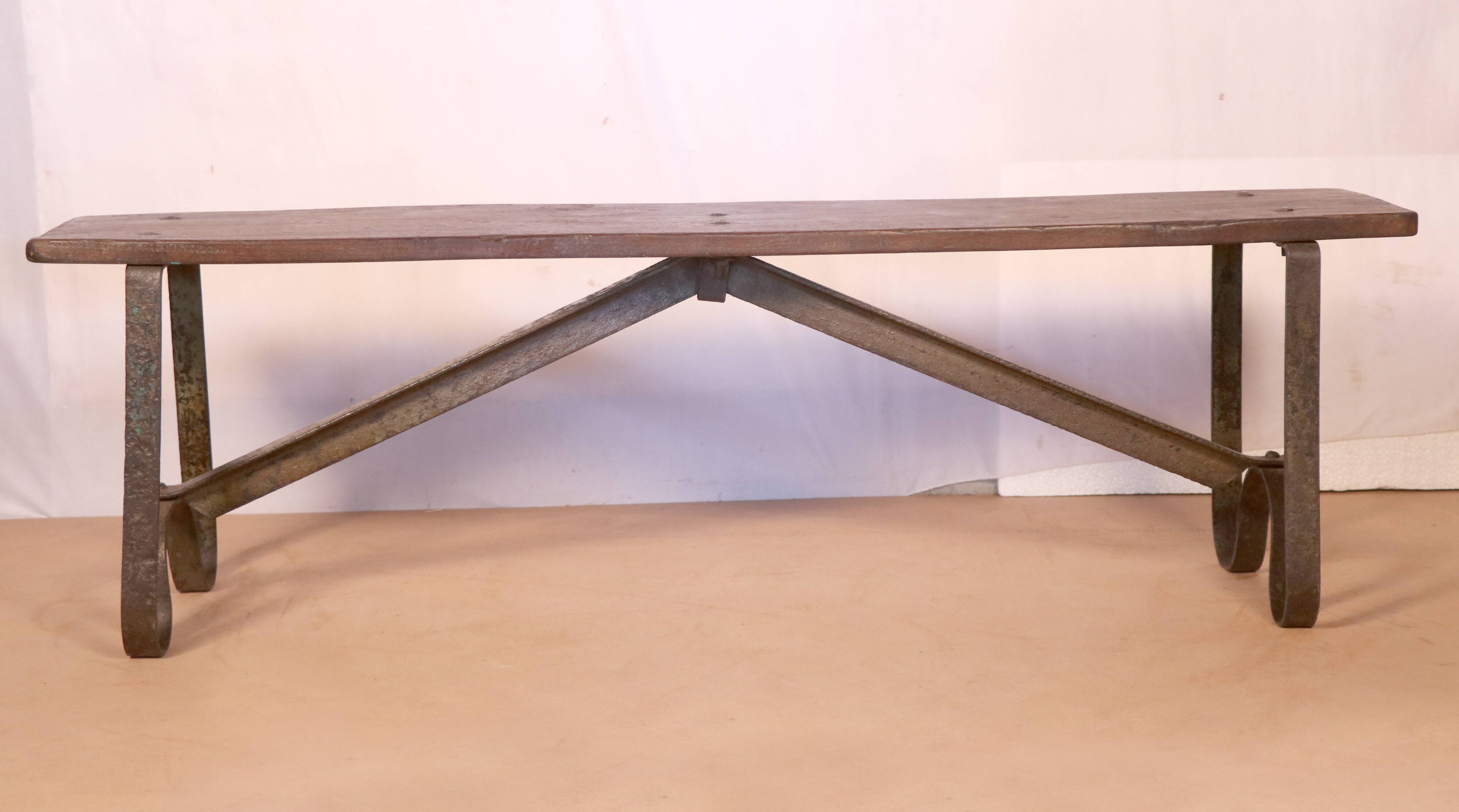 Old Burmese teak bench and wrought iron base