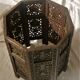 Ancient oriental pedestal table in carved wood