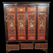 China 19th century: Red lacquer cabinet with gilding from the Qing Dynasty.