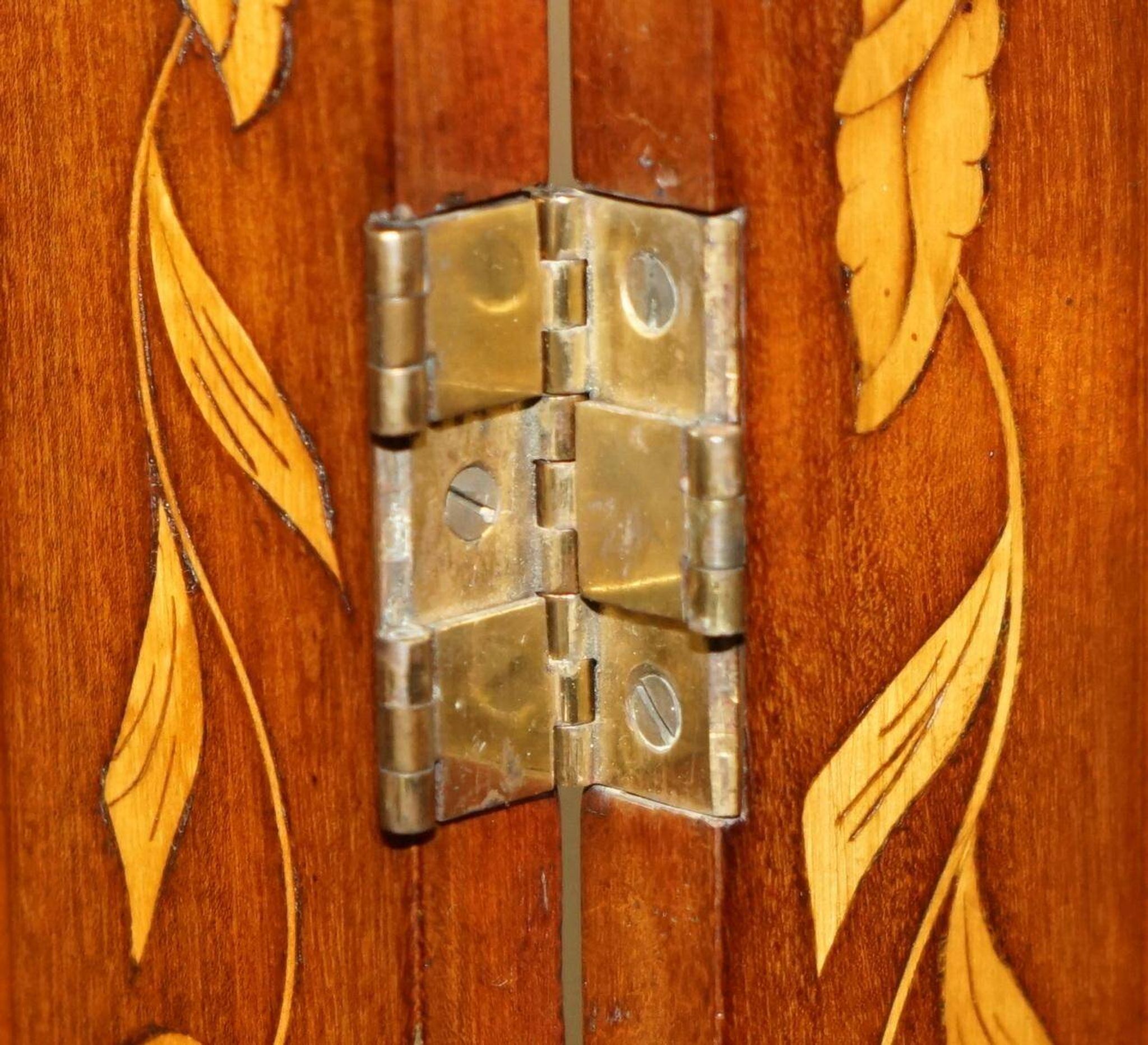 Pair of three-panel screens made of Dutch hardwood and walnut.