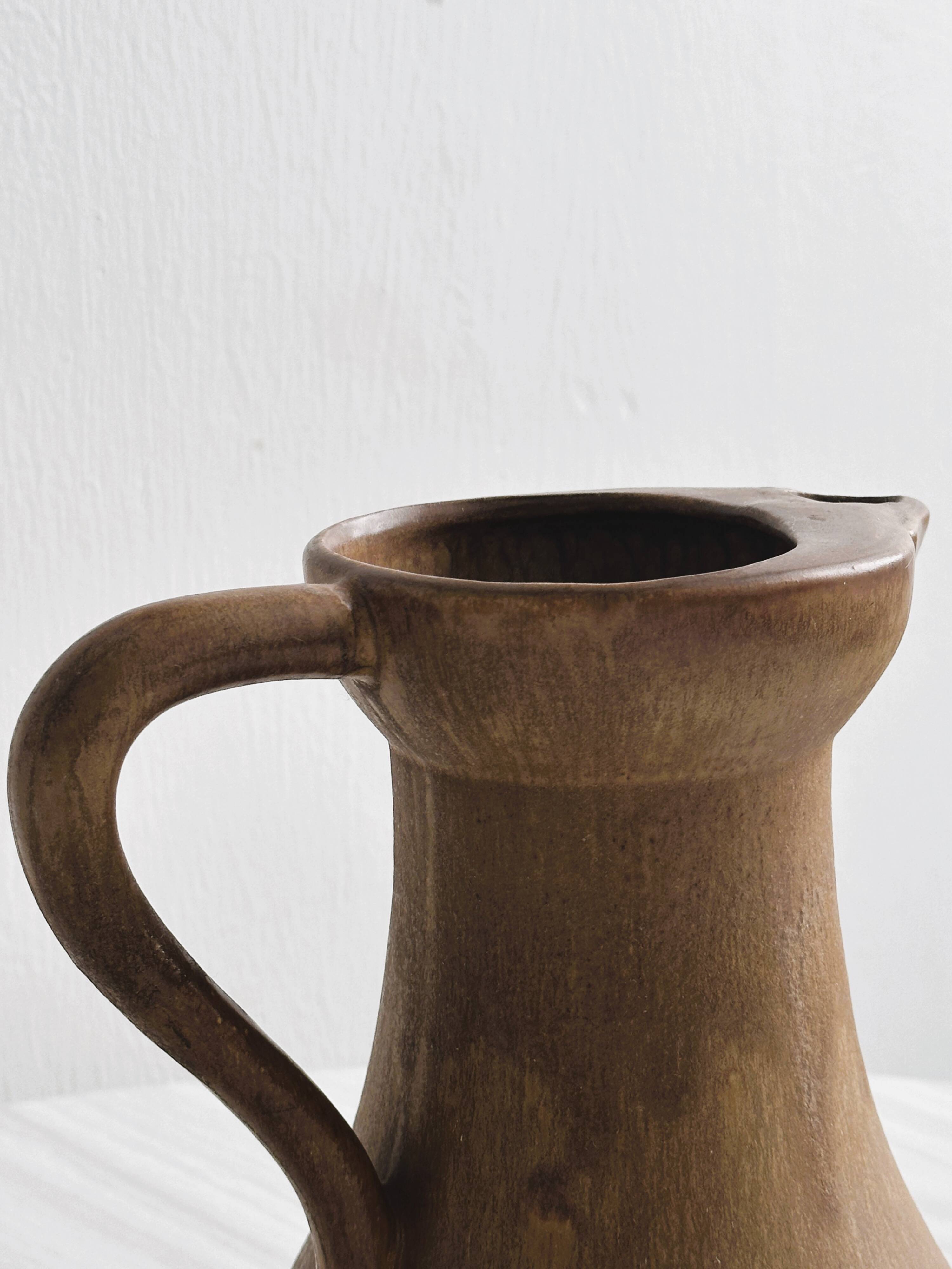 Stoneware pitcher - utensil pot.