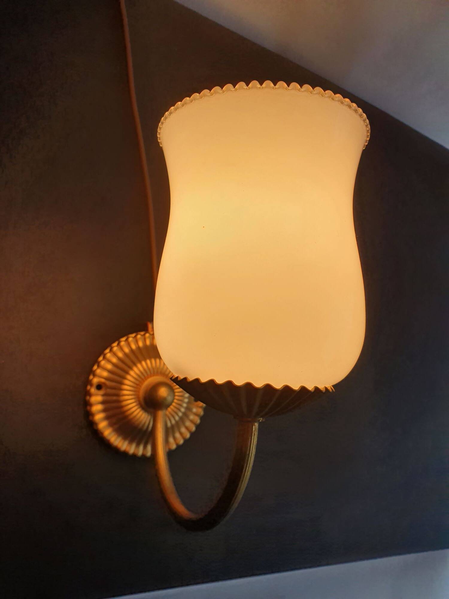 Pair of vintage gold-tone wall sconces with opaline glass globes