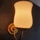Pair of vintage gold-tone wall sconces with opaline glass globes