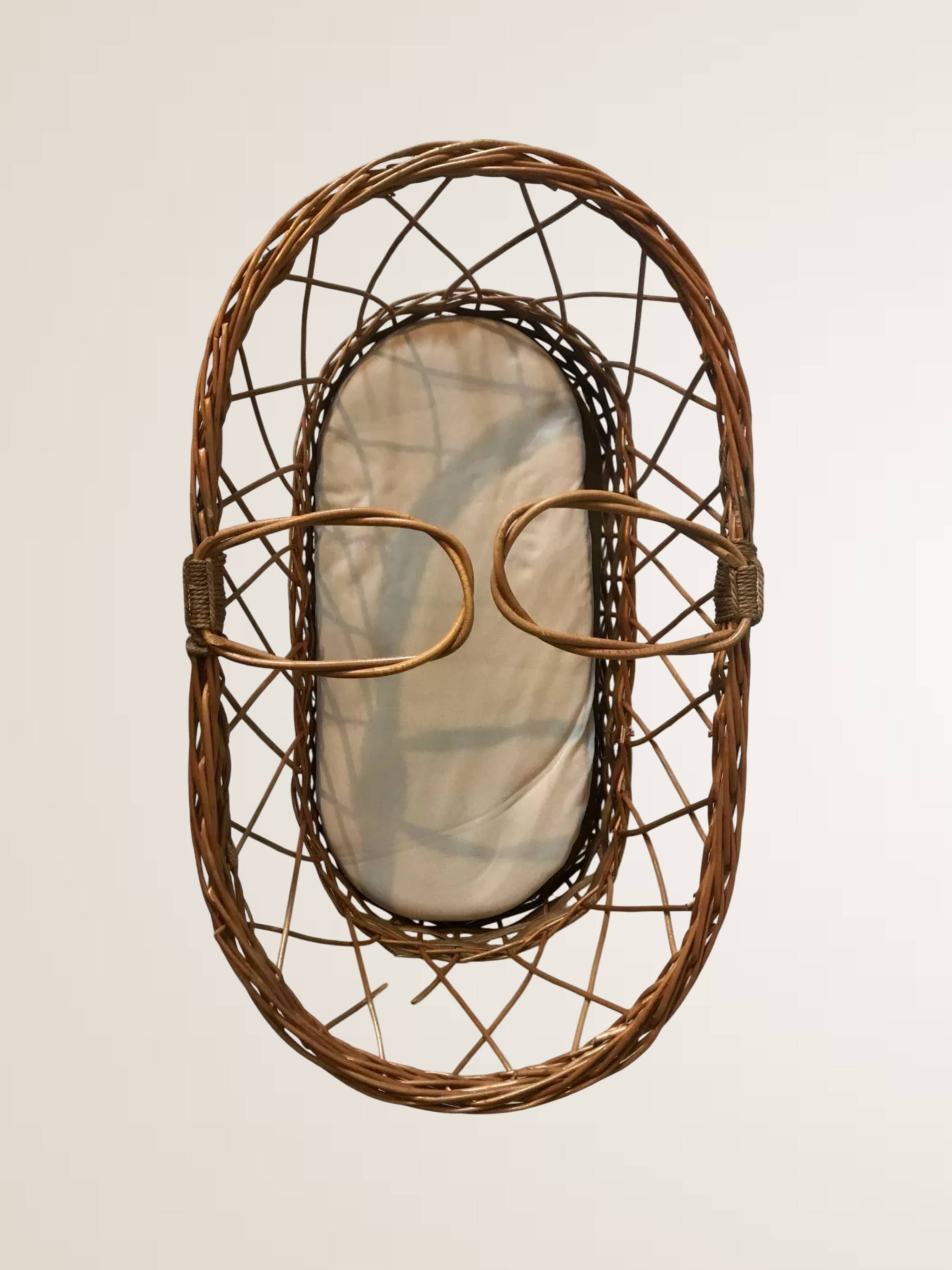 Woven wicker bassinet
