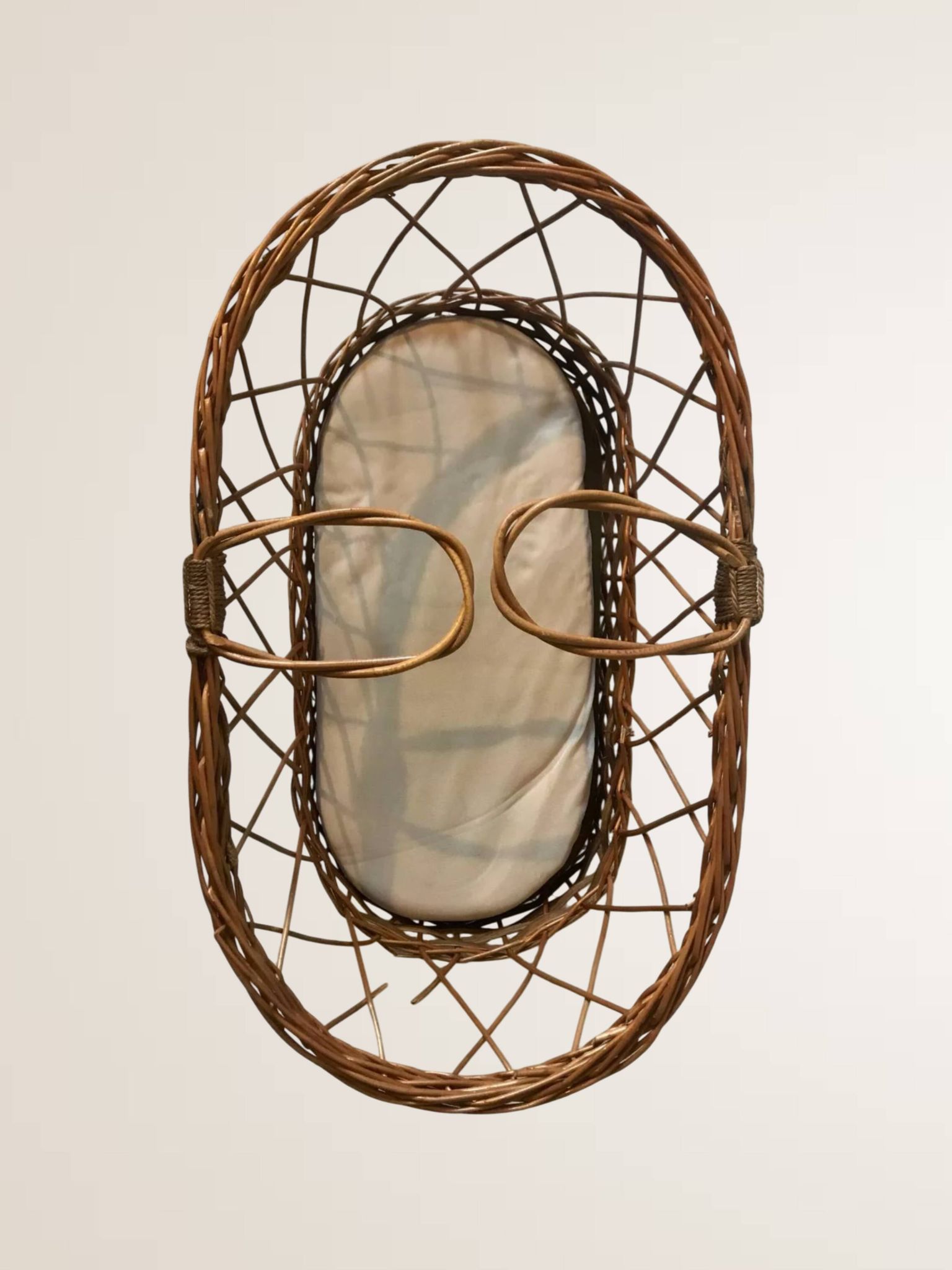 Woven wicker bassinet