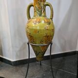 Large decorative vase with handles – painted floral design – on a metal stand