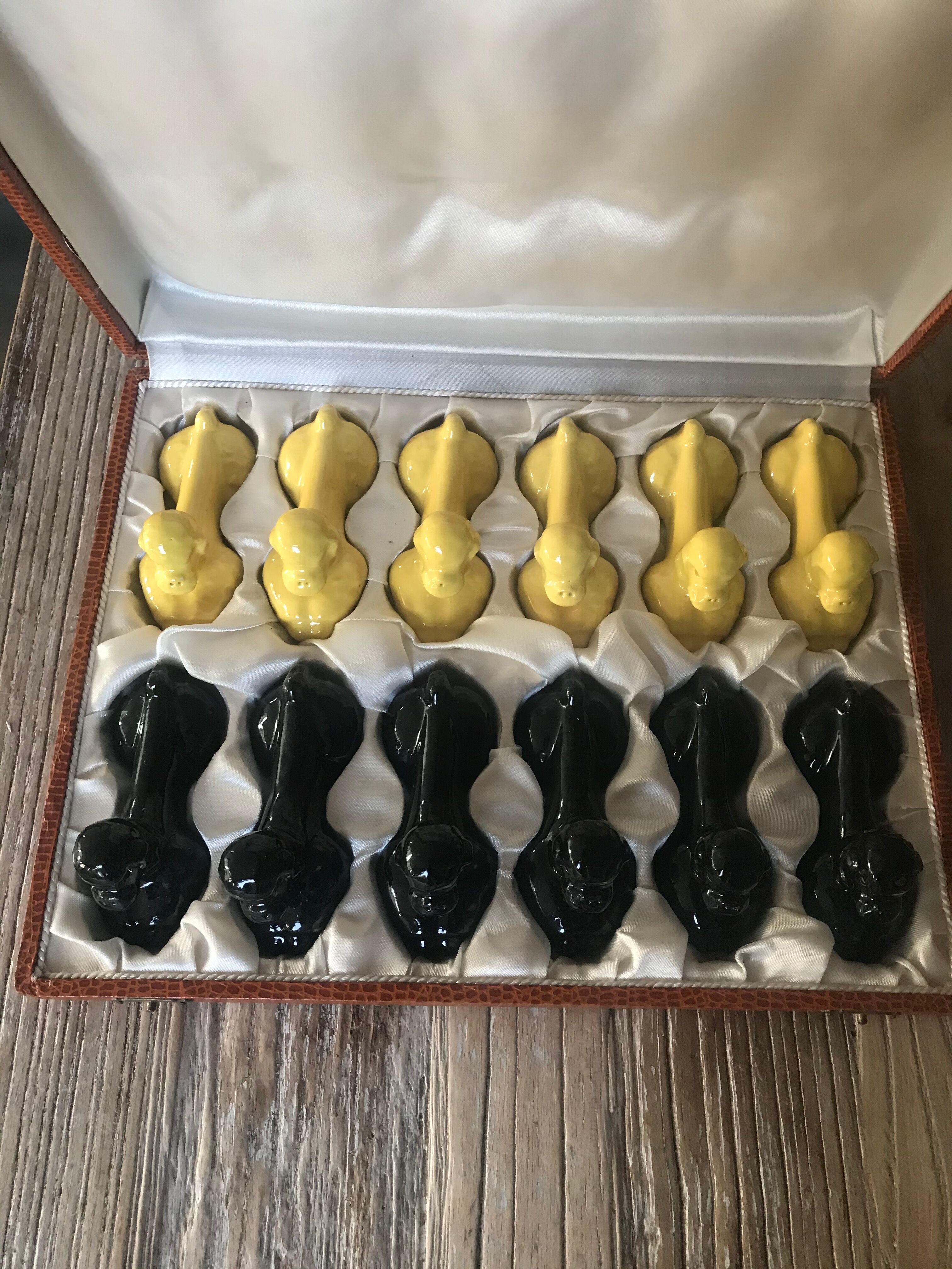 Lot of 12 vintage poodle-shaped knife holders