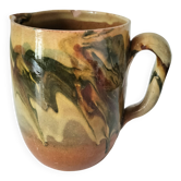 Glazed earthenware jug