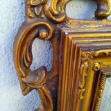 Old large Louis XV style mirror, stucco, wood, resin, beveled