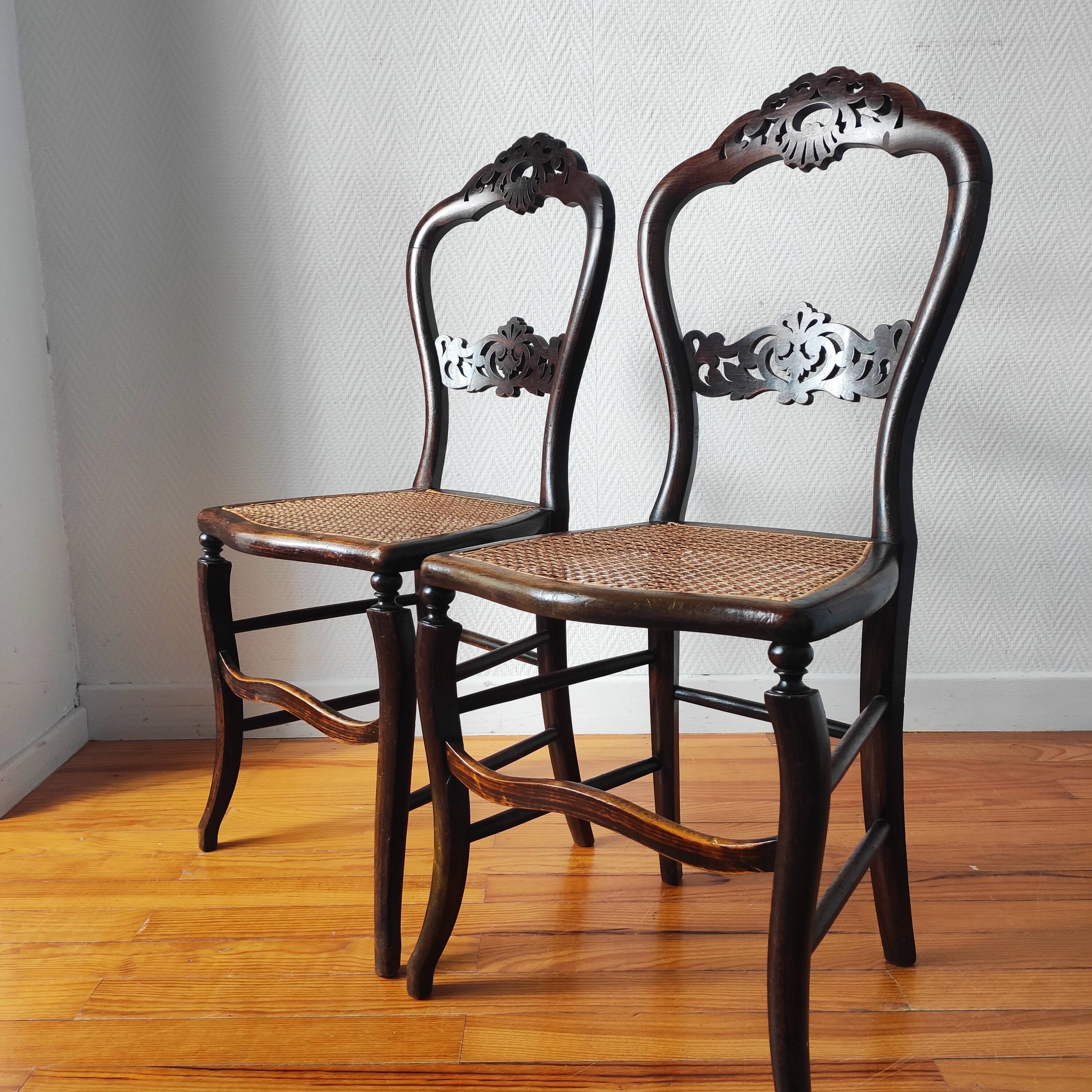 Pair of chairs from the early 20th century, Napoleon III style, with caned seats.